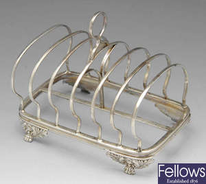 A George IV silver toast rack.