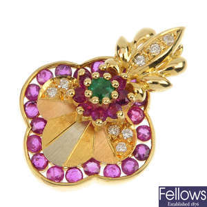 An 18ct gold diamond, ruby and emerald pendant.