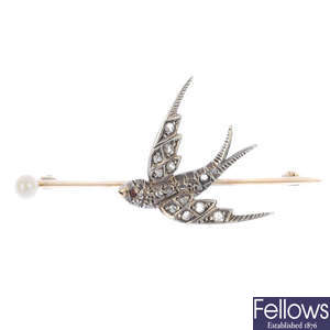 An early 20th century 9ct gold and silver diamond and cultured pearl bird brooch.