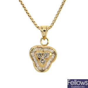 A diamond pendant and chain.