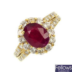 A glass-filled ruby and diamond cluster ring.