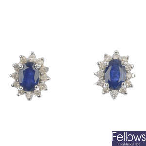 A pair of sapphire and diamond cluster ear studs. 