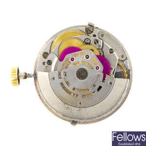 A Rolex movement and dial.