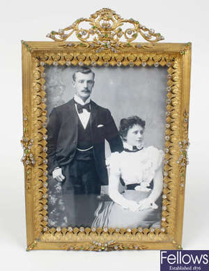 A good late 19th century paste-set brass photograph frame.