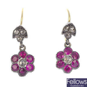 A pair of ruby and diamond cluster ear pendants.