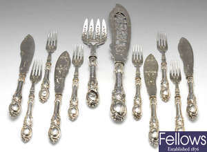 A Victorian pair of silver fish servers and eaters for six place settings.