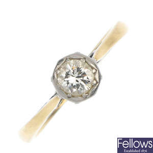 A mid 20th century platinum and 18ct gold diamond single-stone ring.