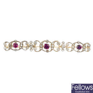 An early 20th century 9ct gold and silver ruby and diamond bar brooch. 