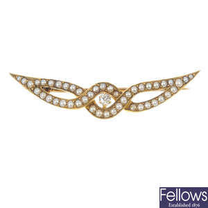 An early 20th century 15ct gold split pearl and diamond brooch.
