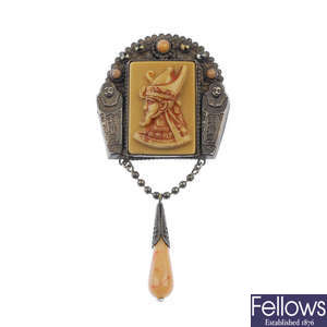 An early 20th century Egyptian revival plastic and paste brooch.