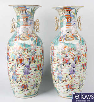 An imposing pair of Canton famille rose porcelain vases