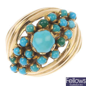 A turquoise dress ring.