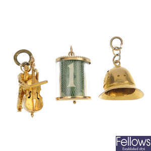 A selection of three 9ct gold charms.