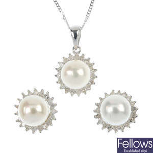 A selection of three cultured pearl and diamond pendant and ear stud sets. 