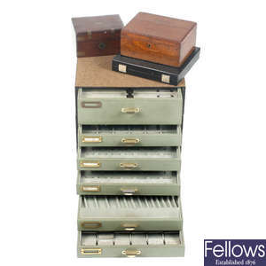 A set of jewellery storage drawers, three portable ring trays and two wooden boxes.
