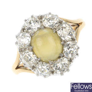 A late 19th century 15ct gold cat's-eye chrysoberyl and diamond cluster ring. 