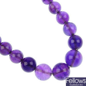 An amethyst bead single-strand necklace.