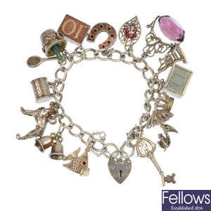 A selection of four charm bracelets.