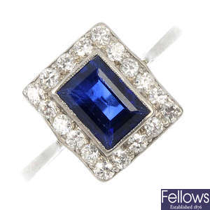 A mid 20th century platinum sapphire and diamond cluster ring.