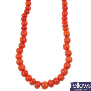 A coral bead necklace, with diamond set clasp.