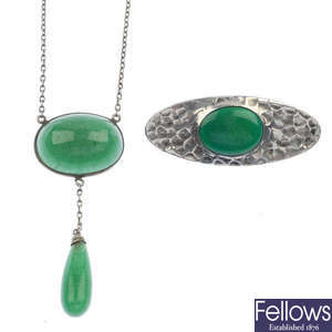 Two items of early 20th century jewellery, to include a pendant and a brooch.