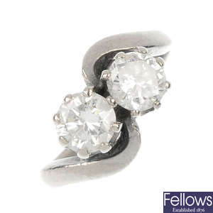 A diamond two-stone crossover ring.