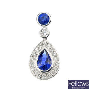 A diamond and sapphire cluster pendant.