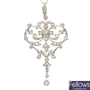 An early 20th century 9ct gold and silver diamond pendant.