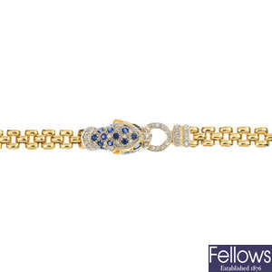 An 18ct gold diamond and sapphire leopard bracelet.