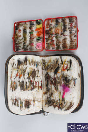 A collection of various mixed fishing flies, plus Hardy fishing rod
