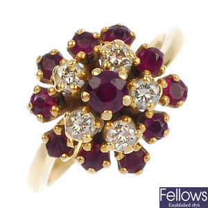 An 18ct gold ruby and diamond floral cluster ring.