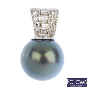 A cultured pearl and diamond pendant. 