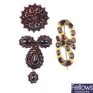 Three late 19th century garnet and paste brooches.