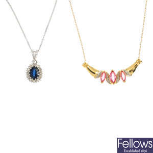 Two 18ct gold diamond and sapphire pendants.