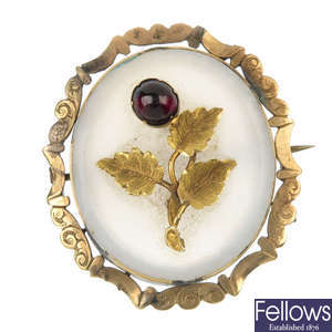 A late Victorian gold and gem-set brooch.