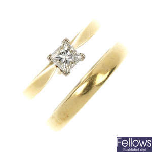 An 18ct gold diamond single-stone ring and an 18ct gold band ring.