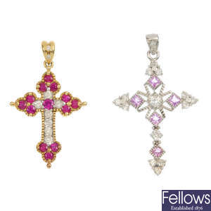A selection of five gem-set cross pendants.