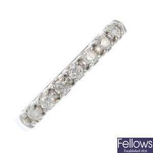 A platinum diamond seven-stone ring.