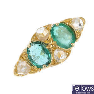An early 20th century 18ct gold emerald and diamond ring.