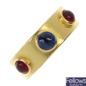 A sapphire and carnelian band ring.