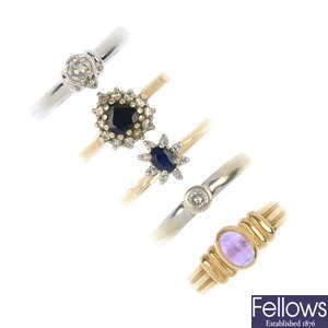A selection of five 9ct gold gem-set dress rings.