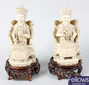 A pair of Chinese carved ivory figures