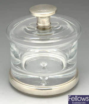 A modern silver mounted glass jar.