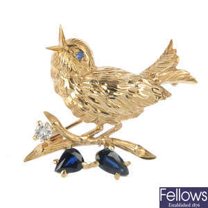 A mid 20th century 9ct gold diamond and sapphire bird brooch.