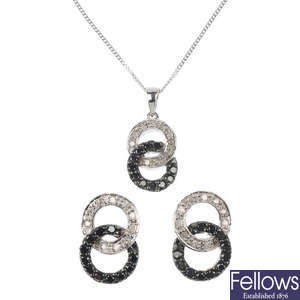 Six sets of diamond and black-gem jewellery. 