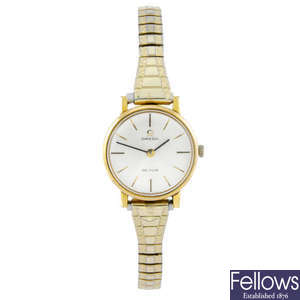 OMEGA – a lady’s gold plated bracelet watch with two Omega watches.