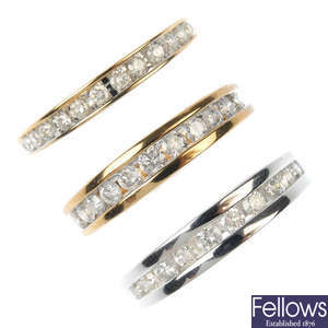 A selection of three 9ct gold half-circle eternity rings.
