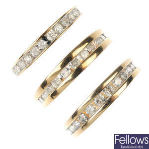 A selection of three 9ct gold half-circle eternity rings.