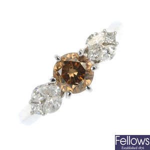 An 18ct gold 'brown' diamond and diamond ring.