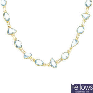 An 18ct gold aquamarine single-strand necklace. 